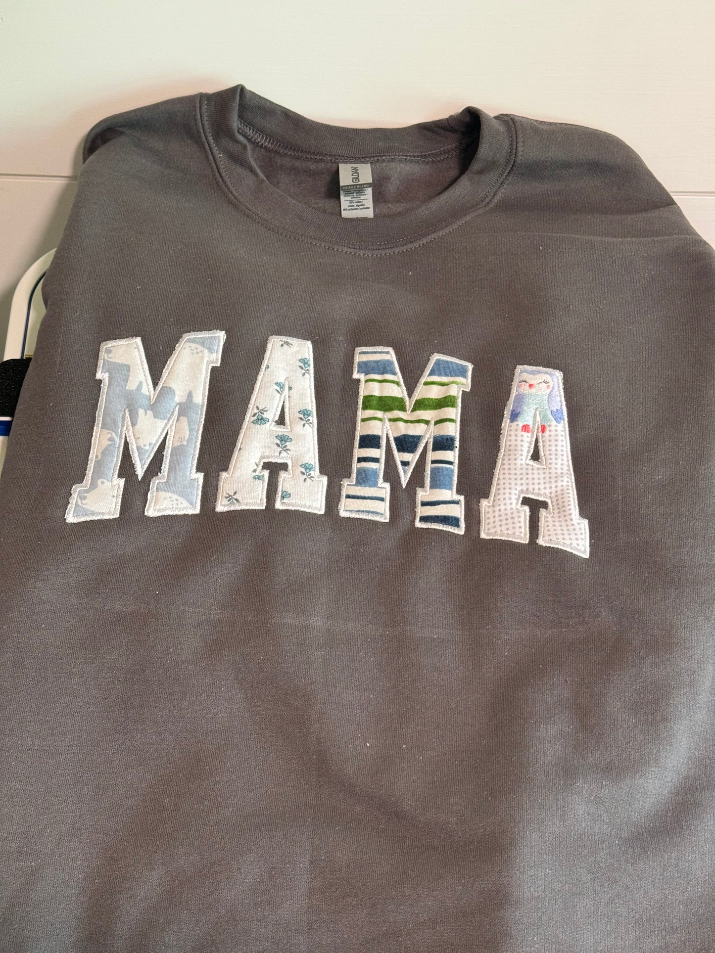 Mama using Baby Clothes